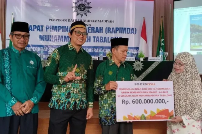 
 Inspiratif, Hj. Normawati Pensiunan Guru Sumbang Rp600 Juta Untuk Pembangunan Masjid di Tabalong